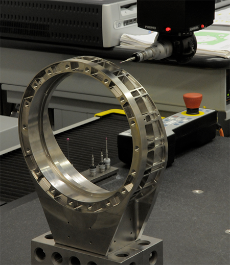 The 6AL-4V titanium housing required machining some features to tolerances as tight as ±0.001 inch.