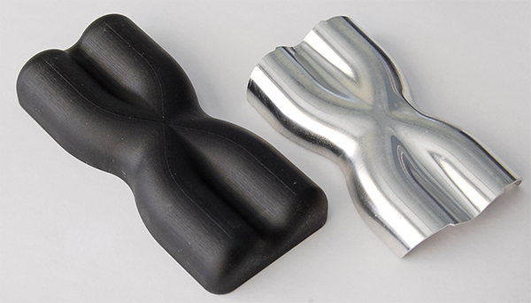 Final Hydroformed Part Next To 3D Printed Tool