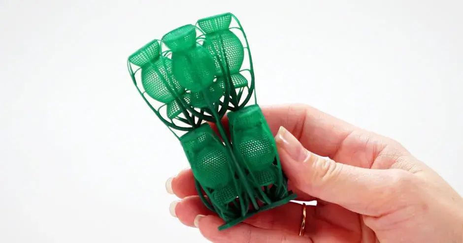 3d-systems-figure-4-jewelcast-grn-10-patterns-tree-v2-womans hand holding jewelry tree cast