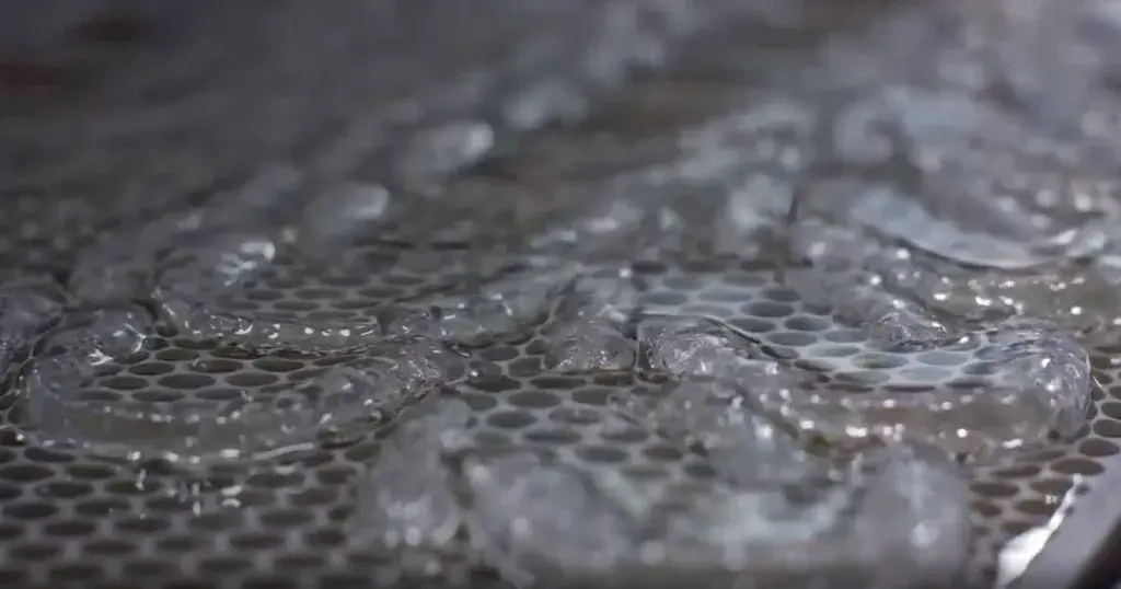 A 3D printer making dental aligners with resin