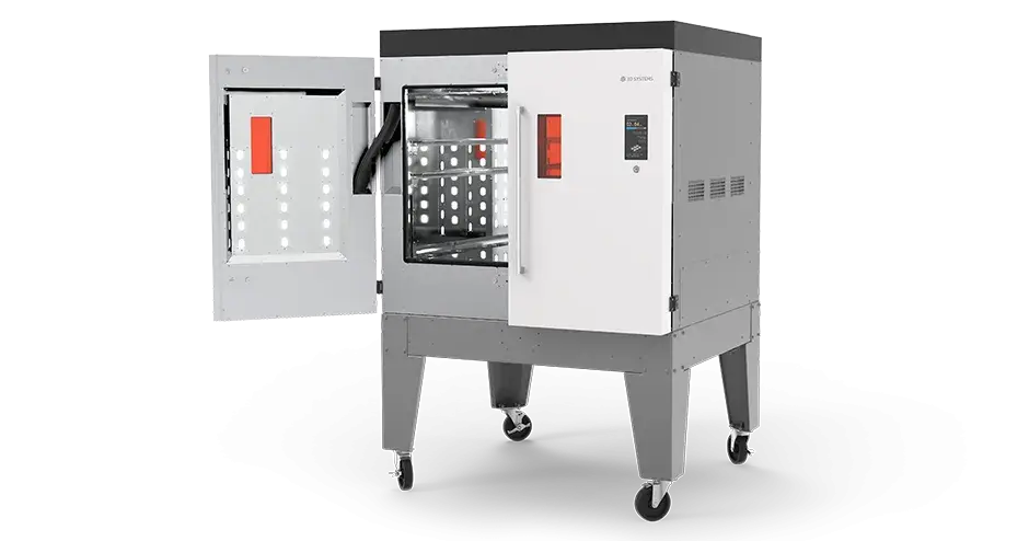 扉が開いてマシンの内部部品が表示されている状態の MDM 後処理マシン