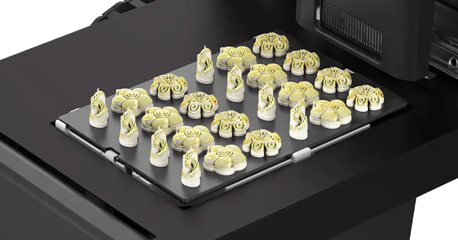 ProJet MJP 2500 printer showing VisiJet M2P-CST Crystal material parts